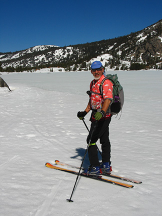 Image of skier along south shore of Lower Echo Lake