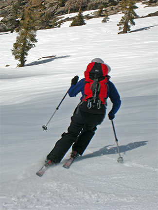 Image of skier at end of great descent